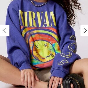 Super cute, super comfortable Nirvana sweater. Oversized